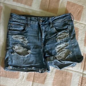 American Eagle Outfitters Lace Pocket Ripped Jean Shorts